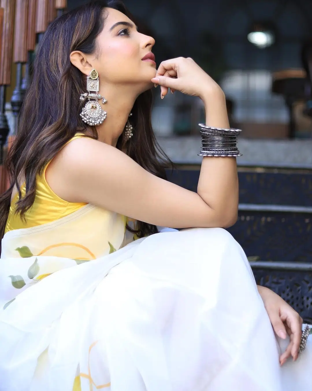 Malvi Malhotra Stills in White Saree Yellow Sleeveless Blouse